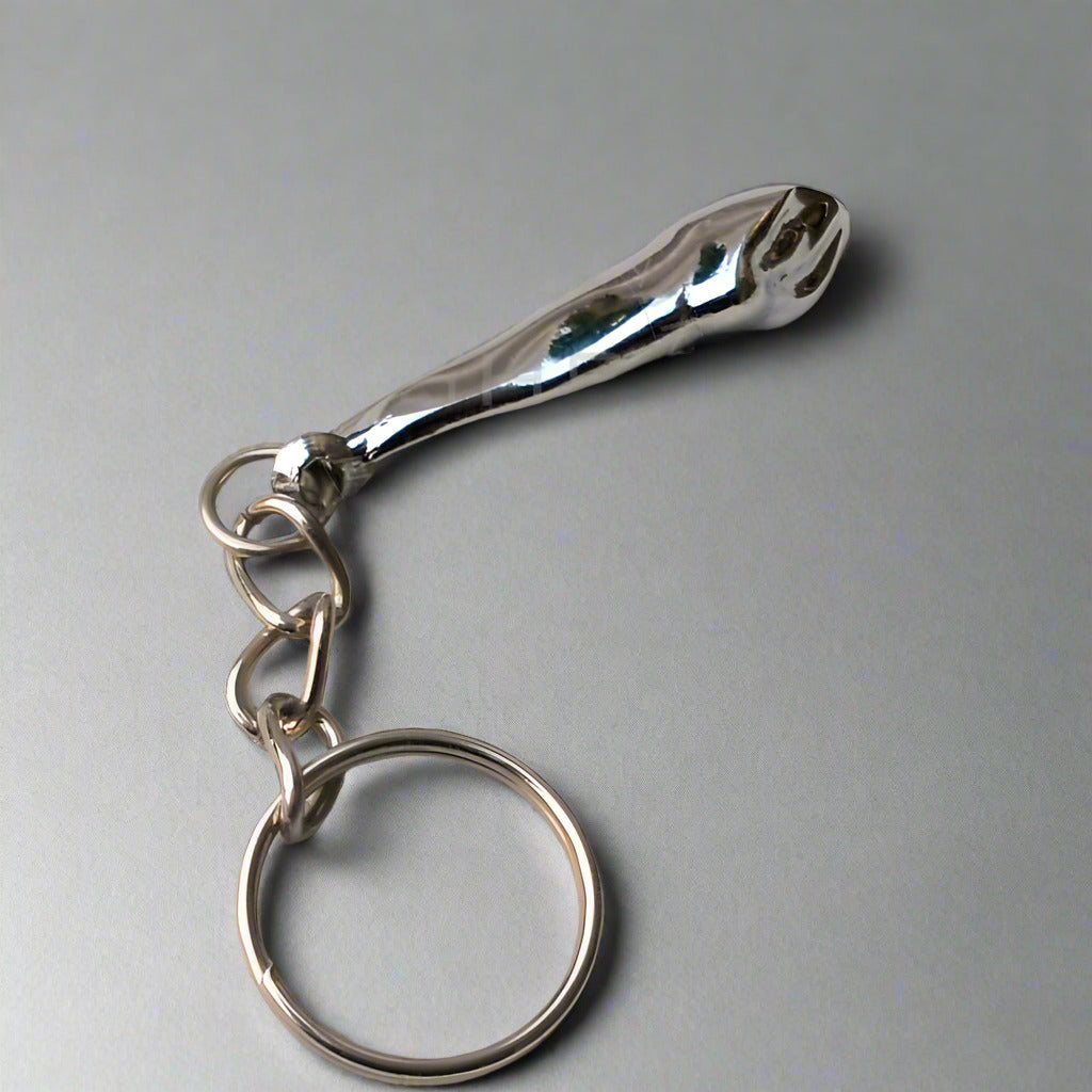 Canine tooth shaped keychain for dental promotions