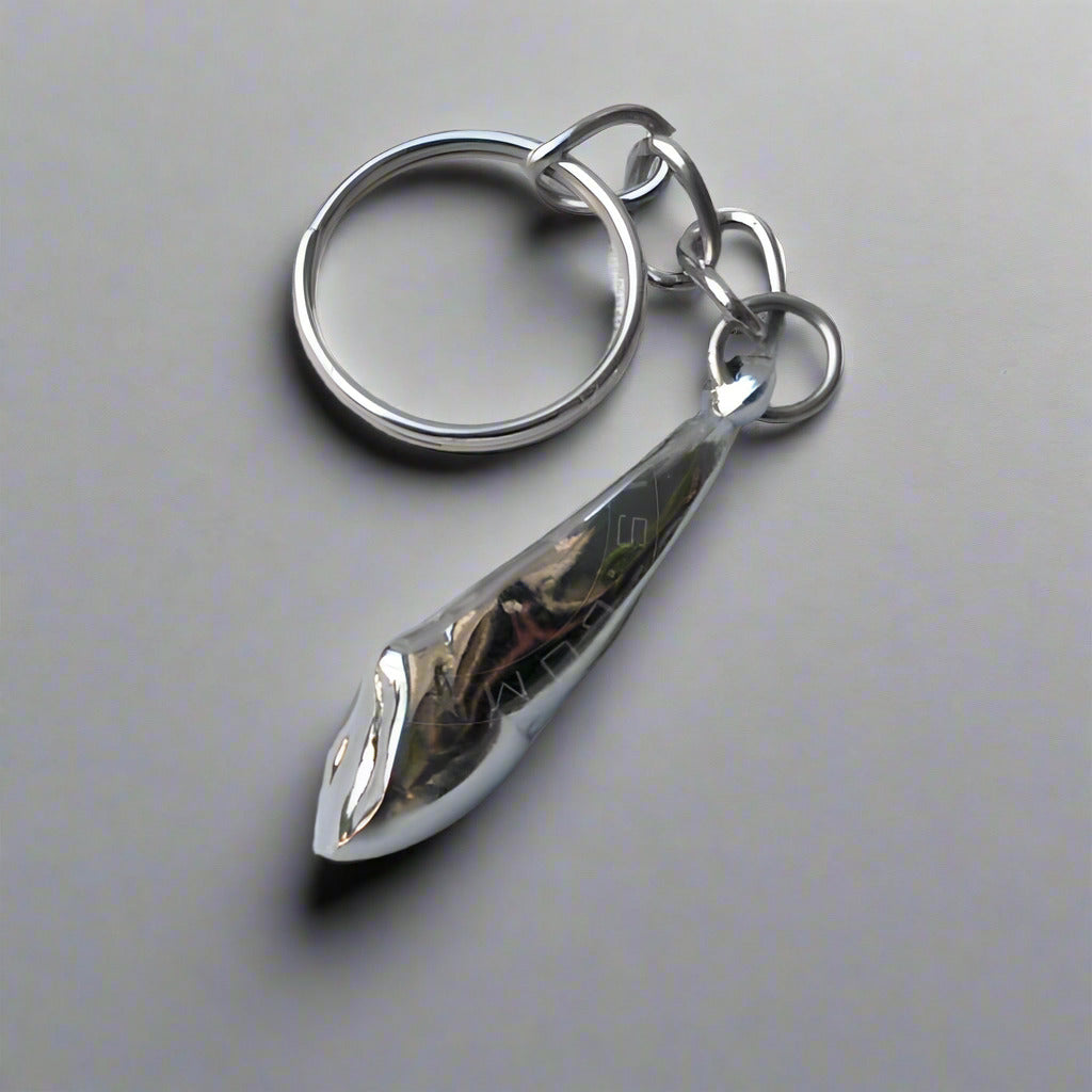 Canine tooth shaped keychain for dental promotions
